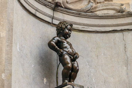 Brussels, Belgium - January 22, 2023: Famous Manneken Pis fountain in Brussels, Belgium. The symbol of Brusselsのeditorial素材