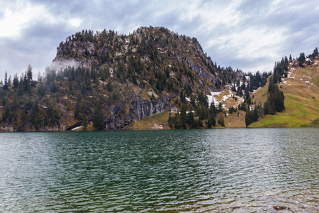 View of the Lake Hinterstocken at the foot of Stockhorn peak in Bernese Oberland, Switzerlandの写真素材