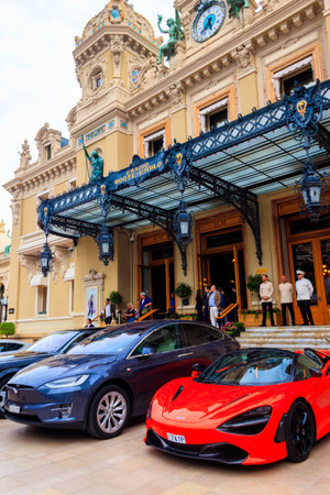 Monte Carlo, Monaco - May 18, 2023: Luxury cars next to Grand Casino in Monte Carlo, Monaco