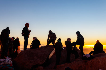South Sinai, Egypt - January 29, 2022: People watching sunrise on the summit of Mount Sinai (Moses Mount) in Egyptのeditorial素材