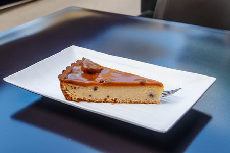 Piece of chestnut cheesecake on a table