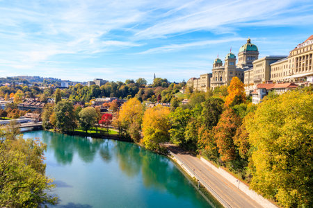 View of Federal Palace of Switzerland and the Aare river in Bern at autumn