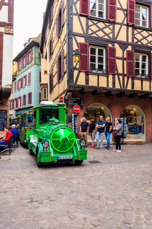 Colmar, France - May 8, 2022: Tourist train riding around the old town of Colmar, Franceのeditorial素材