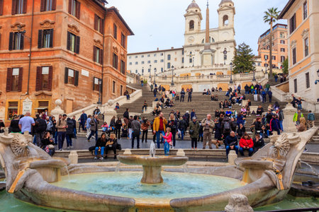 Rome, Italy - March 3, 2023: Fountain of the Boat or Fontana della Barcaccia in Piazza di Spagna, at the foot of the Spanish Steps in Rome, Italyのeditorial素材