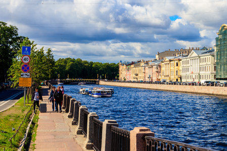 St. Petersburg, Russia - June 26, 2019: Tourist boats sailing on the Fontanka river near Panteleymonovsky Bridge in Saint Petersburg, Russiaのeditorial素材