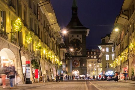 Bern, Switzerland - November 28, 2022: Night city street decorated for Christmas in Bern,...