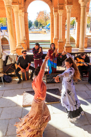 Seville, Spain - December 15, 2023: Flamenco dancers performs in public at Plaza de Espana (Spain square) in Seville, Andalusia, Spain