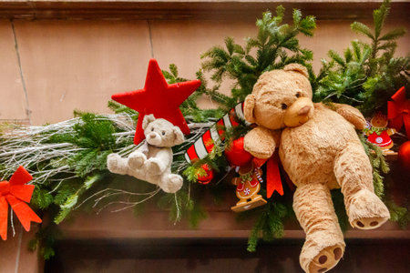 Christmas decoration with toys and teddy bears on a facades in medieval city of Colmar, Franceの写真素材