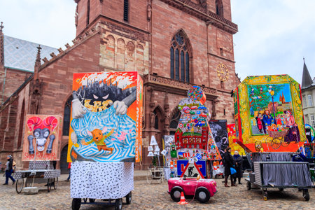 Basel, Switzerland - February 28, 2023: Cathedral square with carnival lantern exhibition during...