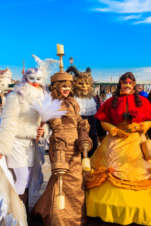 Venice, Italy - February 11, 2023: Unidentified people dressed as Beauty and the Beast characters during the annual Venice Carnival in Venice, Italyのeditorial素材