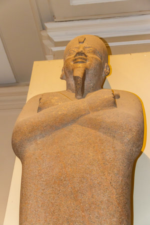 Cairo, Egypt - December 8, 2018: Stone statue of pharaohs in Museum of Egyptian Antiquities, known...