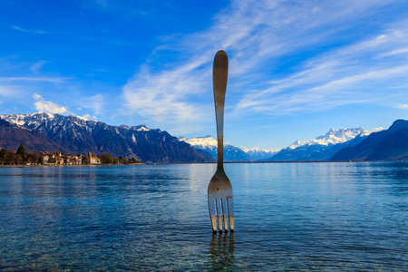 Fork of Vevey is a 8 meter stainless steel fork in water of Lake Geneva in Vevey, Switzerlandの写真素材
