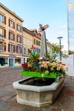 Water fountain decorated for Easter in Morges, Switzerlandの写真素材