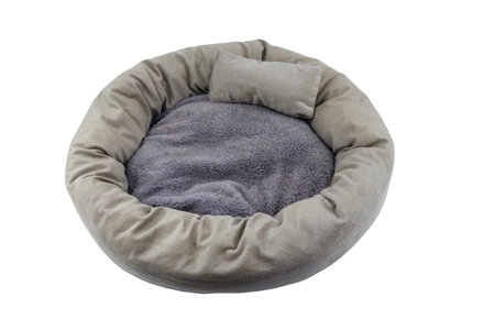 Comfortable pet bed isolated on white backgroundの写真素材