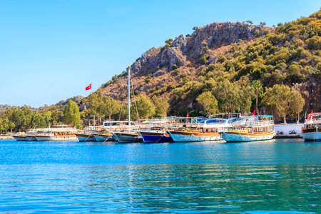 Port with tourist boats on the Mediterranean sea coast in Turkeyの写真素材