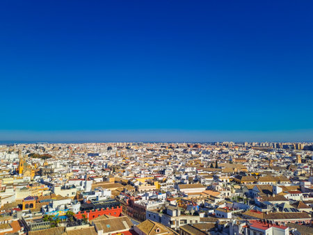 Aerial panoramic view of the old city rooftops from the Giralda Tower in Seville, Andalusia, Spainの写真素材