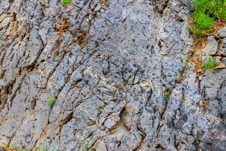 Natural texture of a mountain cliff rock for backgroundの写真素材