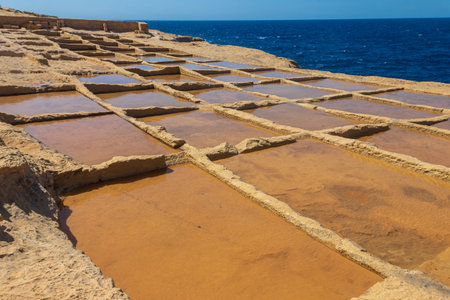 Picturesque scene of salt pans on Gozo island, Maltaの写真素材