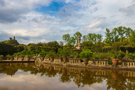 View of Isolotto, an oval-shaped island with the Fountain of the Ocean in the middle, in Boboli Gardens, Florence, Italyの写真素材