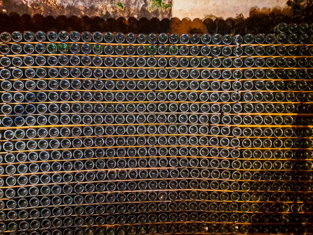 Background of wine bottles in a wine cellar