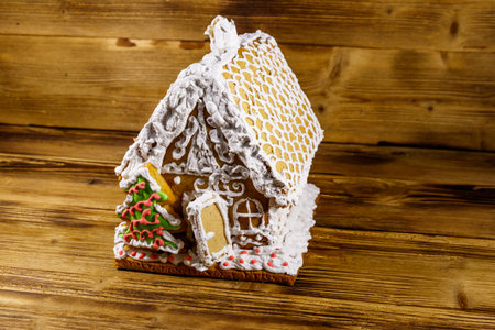 Christmas Gingerbread house on a wooden tableの写真素材