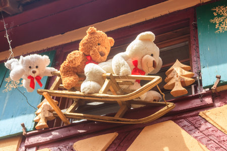 Christmas decoration with toys and teddy bears on a facades in Alsace, Franceの写真素材