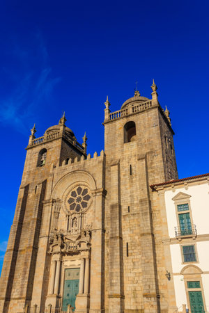 Facade of the Porto Cathedral (Cathedral of the Assumption of Our Lady) in Porto, Portugalの写真素材