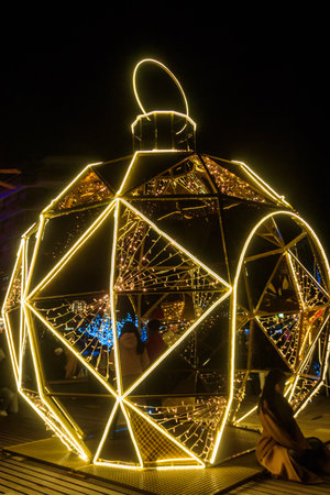 Montreux, Switzerland â December 15, 2024: Large illuminated Christmas bauble at the Christmas market in Montreux, Switzerlandのeditorial素材