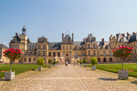 Fontainebleau, France - August 15, 2025: Exterior of medieval Palace of Fontainebleau, France. UNESCO World Heritage Siteのeditorial素材