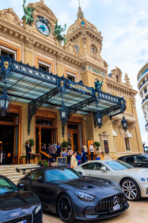 Monte Carlo, Monaco - May 18, 2023: Luxury cars next to Grand Casino in Monte Carlo, Monacoのeditorial素材
