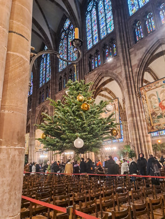 Strasbourg, France - December 9, 2023: Christmas decoration in Cathedral of Our Lady of Strasbourg in Strasbourg, Franceのeditorial素材
