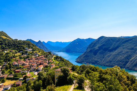 Scenic view of lake Lugano from Monte Bre mountain in Ticino canton, Switzerlandの写真素材