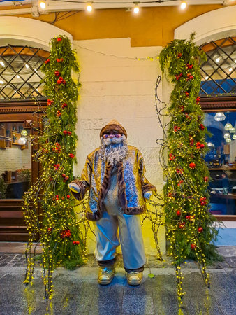 Figure of Santa Claus with two luminous reindeers. Beautiful Christmas street decorationの写真素材