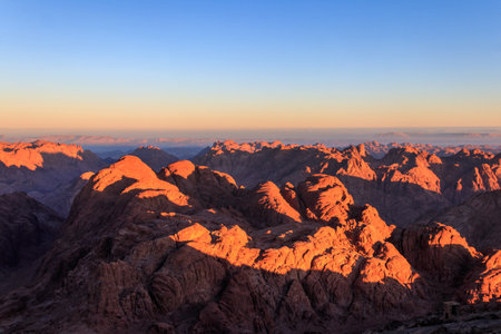 View of the rocky Sinai mountains and desert from Mount Sinai in morning in Egyptの写真素材