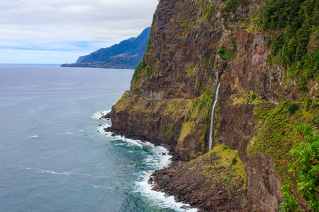 Beautiful view of Bridal Veil waterfall (Cascata do Veu da Noiva) near Porto Moniz and Seixal seen from the Veu da Noiva viewpoint. Madeira Island, Portugalの写真素材