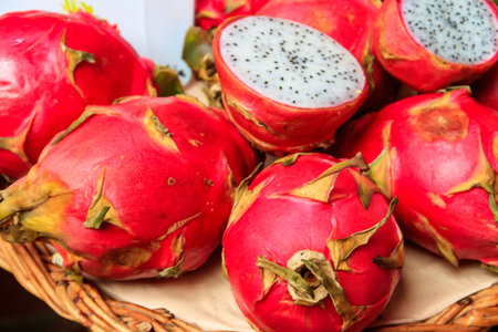 Fresh dragon fruits on a market stallの写真素材