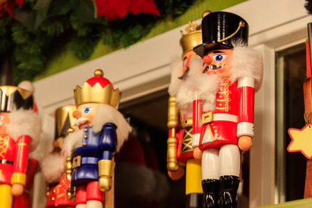 Variety of Christmas wooden nutcrackers on the shelves in a store. Festive Christmas tradeの写真素材