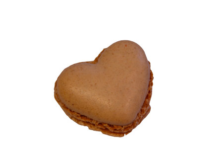 Sweet heart shaped macaroon isolated on white backgroundの写真素材