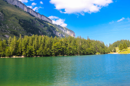 View of Lake Seealpsee near Appenzell in the Alpstein mountain range, Ebenalp, Switzerlandの写真素材