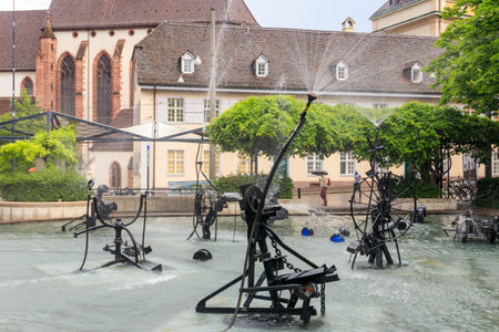 Basel, Switzerland - May 23, 2022: Tinguely fountain, also known as Carnival Fountain in the center...