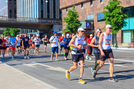 Stockholm, Sweden - June 1, 2024: People running the Stockholm marathon in Stockholm, Sweden