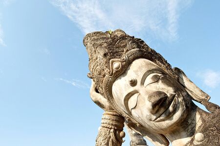 February 21, 2015: Head of Reclining Buddha in Buddha Park Sala Kaeo Kou near Nong Khai, Thailandのeditorial素材