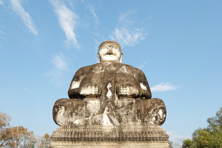 February 21, 2015: Buddha on background of blue sky in Buddha Park Sala Kaeo Kou near Nong Khai, Thailandのeditorial素材