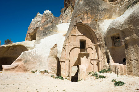 Cave church in Cappadocia, ruins of Hallach monastery, historical landmark, ancient religious complex carved into the rock, Central Anatolia, Turkeyの写真素材