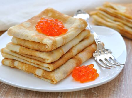 Pancakes with red caviarの写真素材