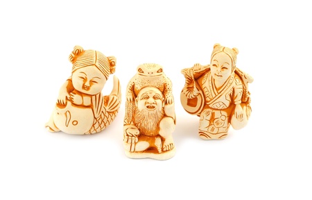 Japanese miniature figures netsuke on a white background