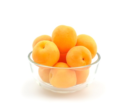 	Apricots in a glass bowlの写真素材