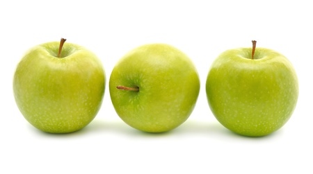 	Three green apples on white backgroundの写真素材