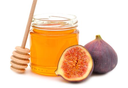 	Honey and figs on a white backgroundの写真素材