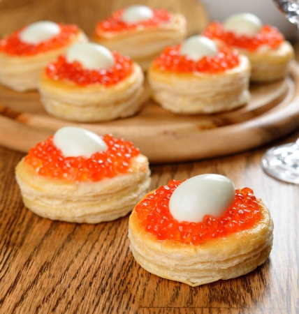 Appetizer with red caviar and quail eggsの写真素材